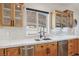 Bright kitchen with stainless steel appliances, custom cabinets and mountain view at 868 Marina Dr, Boulder City, NV 89005