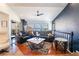 Beautiful living room with a cozy fireplace, scenic views, and stylish furnishings at 868 Marina Dr, Boulder City, NV 89005