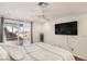 Bright main bedroom with glass sliding doors leading to the backyard area at 868 Marina Dr, Boulder City, NV 89005