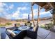 Inviting outdoor patio with comfortable seating and scenic views of mountains and lake at 868 Marina Dr, Boulder City, NV 89005
