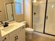 Bathroom with white vanity and a glass shower at 9813 Belikove Manor Ave, Las Vegas, NV 89178