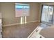 Bright dining area with sliding door access to patio at 9813 Belikove Manor Ave, Las Vegas, NV 89178