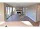 Spacious living room with fireplace and tile flooring at 9813 Belikove Manor Ave, Las Vegas, NV 89178
