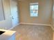 Small office with wood-look floors and a window at 9813 Belikove Manor Ave, Las Vegas, NV 89178