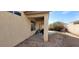 View of the backyard and the patio area; backyard needs landscaping at 1013 Adobe Flat Dr, Henderson, NV 89011