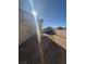 View of the backyard and the patio area; backyard needs landscaping at 1013 Adobe Flat Dr, Henderson, NV 89011