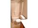 A bathroom with linoleum tile and a shower with patterned curtain at 1013 Adobe Flat Dr, Henderson, NV 89011