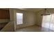 Dining area featuring a modern light fixture and backyard access at 1013 Adobe Flat Dr, Henderson, NV 89011