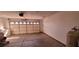 Attached garage with garage door and washer/dryer hookups at 1013 Adobe Flat Dr, Henderson, NV 89011
