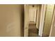 Neutral-toned hallway leading to various rooms with several doors in view at 1013 Adobe Flat Dr, Henderson, NV 89011