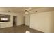 Living room with wood-look floors and ceiling fan at 1013 Adobe Flat Dr, Henderson, NV 89011