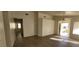 Living room with wood-look floors and exterior view at 1013 Adobe Flat Dr, Henderson, NV 89011