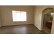 Spacious main bedroom with an ensuite bathroom featuring an arched entryway at 1013 Adobe Flat Dr, Henderson, NV 89011