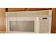 A white microwave is located above the counter and has many different options available at 1013 Adobe Flat Dr, Henderson, NV 89011
