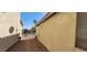 Gravel pathway between two houses at 1013 Adobe Flat Dr, Henderson, NV 89011