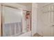 Clean bathroom featuring a bathtub with shower, built-in storage, and a practical layout at 2725 S Nellis Blvd # 2108, Las Vegas, NV 89121