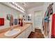 Well-lit bathroom with double sinks, a spacious vanity, and a shower, combining comfort and functionality at 2725 S Nellis Blvd # 2108, Las Vegas, NV 89121