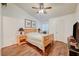 Comfortable bedroom with wood flooring, a vaulted ceiling, and ample natural light, creating a relaxing retreat at 2725 S Nellis Blvd # 2108, Las Vegas, NV 89121
