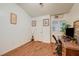 Simple bedroom featuring a desk, wood floors, and a neutral color palette at 2725 S Nellis Blvd # 2108, Las Vegas, NV 89121