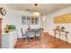 Dining room featuring hardwood floors and a view into the bedroom at 2725 S Nellis Blvd # 2108, Las Vegas, NV 89121