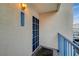 Front entry featuring a security screen door and blue railing, ensuring a safe and welcoming approach at 2725 S Nellis Blvd # 2108, Las Vegas, NV 89121