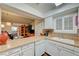 Eat-in kitchen with a view to the living room and patio at 2725 S Nellis Blvd # 2108, Las Vegas, NV 89121