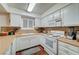 Bright kitchen with white cabinets, laminate countertops and tile backsplash at 2725 S Nellis Blvd # 2108, Las Vegas, NV 89121