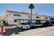 Exterior of condo building with covered parking spots and well maintained desert landscaping at 2725 S Nellis Blvd # 2108, Las Vegas, NV 89121