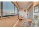 Relaxing enclosed patio with comfortable seating and privacy screens, ideal for enjoying the outdoors at 2725 S Nellis Blvd # 2108, Las Vegas, NV 89121