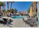 Inviting community pool with seating areas, perfect for enjoying the outdoors and socializing with neighbors at 2725 S Nellis Blvd # 2108, Las Vegas, NV 89121