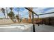 Backyard with a pool and wooden pergola at 6232 Blair Way, Las Vegas, NV 89107