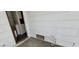 Backyard with an exterior door and damaged siding at 6232 Blair Way, Las Vegas, NV 89107