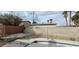 Backyard view of pool, fence, and neighboring homes at 6232 Blair Way, Las Vegas, NV 89107