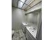 Bathroom with double vanity and tiled floor at 6232 Blair Way, Las Vegas, NV 89107