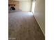 Brick fireplace with a wooden mantel in the living room at 6232 Blair Way, Las Vegas, NV 89107
