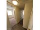 Clean hallway with wood-look flooring and access to rooms at 6232 Blair Way, Las Vegas, NV 89107