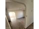 Open living area with hardwood floors and archways at 6232 Blair Way, Las Vegas, NV 89107