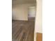 Bright living room with hardwood floors and views to another room at 6232 Blair Way, Las Vegas, NV 89107