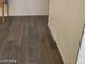 Living room with wood-look floors at 6232 Blair Way, Las Vegas, NV 89107