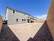 Spacious backyard with a covered patio perfect for entertaining at 10208 Bismarck Palms Ave, Las Vegas, NV 89166