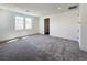 Large bedroom featuring plush carpeting, recessed lighting, and bright natural light at 10208 Bismarck Palms Ave, Las Vegas, NV 89166