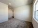 Bright bedroom with carpet and a window that lets in lots of natural light at 10208 Bismarck Palms Ave, Las Vegas, NV 89166