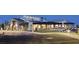 This community clubhouse features a welcoming entrance and outdoor seating at 10208 Bismarck Palms Ave, Las Vegas, NV 89166