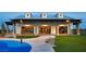 A well-equipped community gym with modern machines is displayed behind large sliding glass doors at 10208 Bismarck Palms Ave, Las Vegas, NV 89166