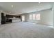 Open-concept living space featuring modern finishes and an attached kitchen at 10208 Bismarck Palms Ave, Las Vegas, NV 89166