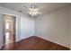 The bedroom features hardwood floors, a closet and neutral paint at 4357 Valley Regal Way, North Las Vegas, NV 89032