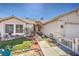 Cozy single-story home featuring desert landscaping, a quaint walkway, and a welcoming facade at 4357 Valley Regal Way, North Las Vegas, NV 89032
