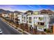 Street view of Cordillera townhouses with mountain backdrop at 655 Spotted Falcon St, Las Vegas, NV 89138