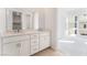 Modern bathroom with double vanity and large mirror at 655 Spotted Falcon St, Las Vegas, NV 89138