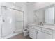 Clean bathroom with a white vanity and a walk-in shower at 655 Spotted Falcon St, Las Vegas, NV 89138